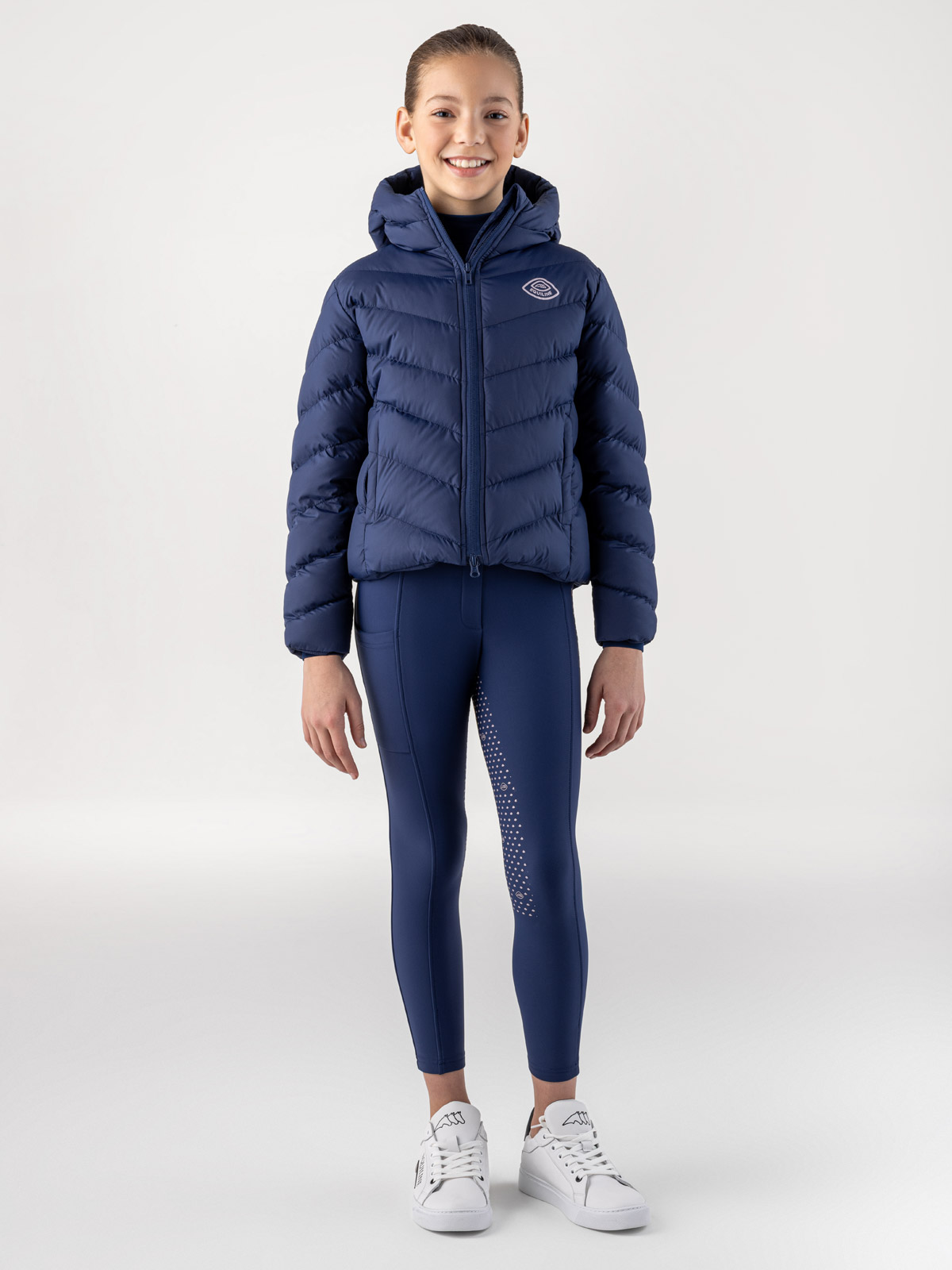 Veste matelassée avec capuche en bleu marine avec el logo en rose pour junior Cumin - Equiline