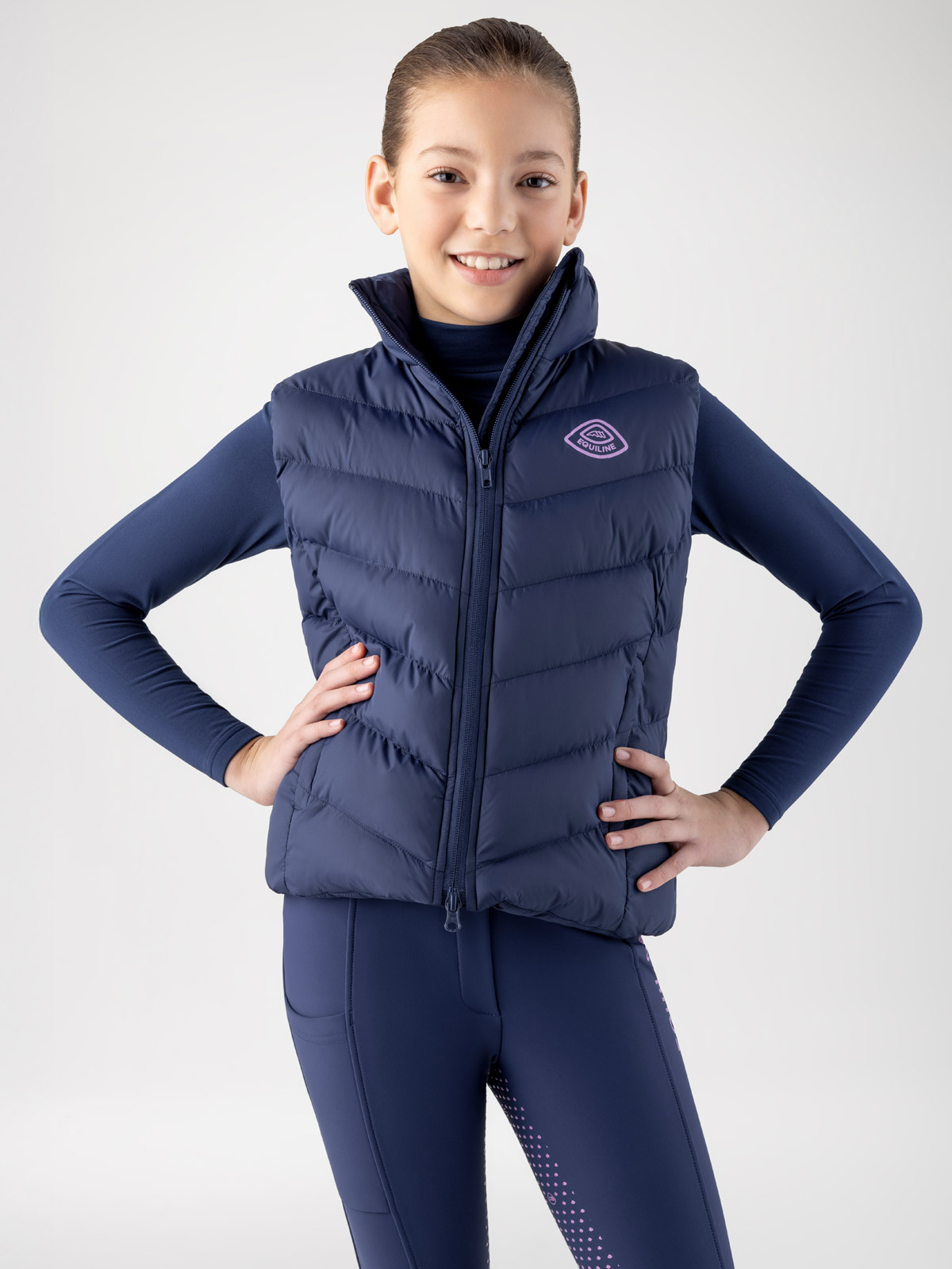 Gilet matelassé bleu marine avec el logo rose pour junior Cetz - Equiline