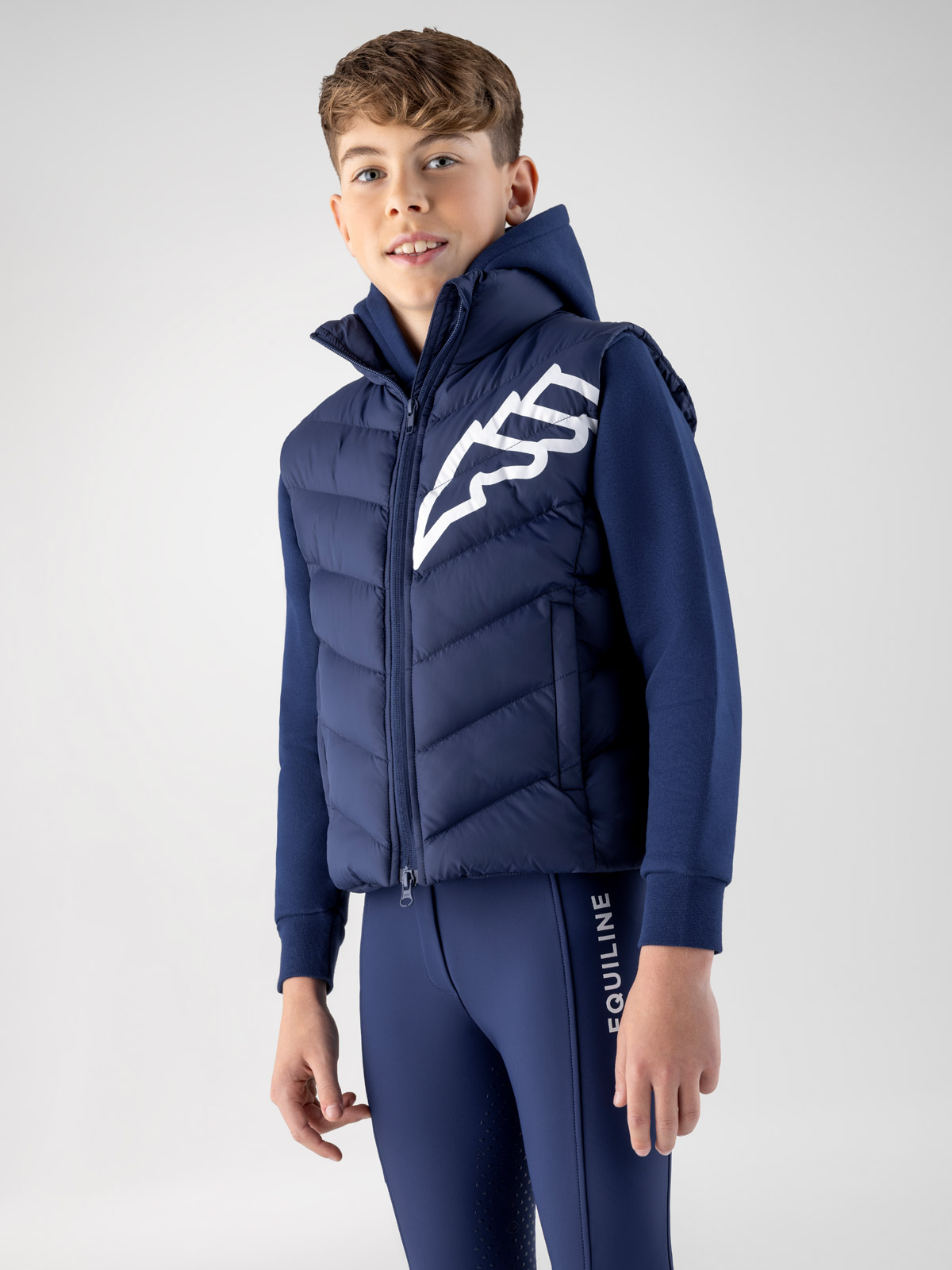 Gilet matelassé bleu marine avec el logo en blanc pour junior Cerk - Equiline